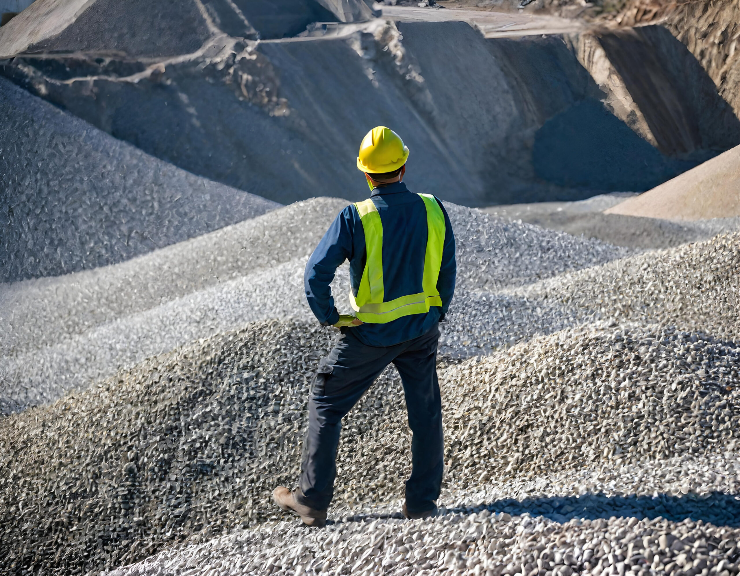miner looks out over a field of common construction aggregates